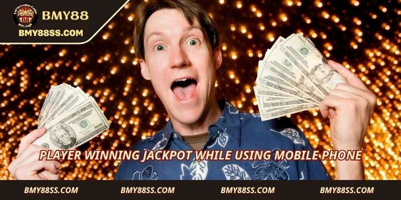 Player winning jackpot while using mobile phone
